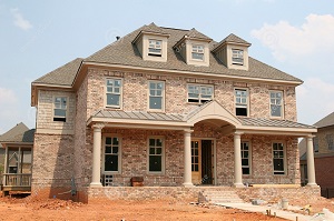 http://www.dreamstime.com/royalty-free-stock-photo-new-brick-home-construction-image2820225